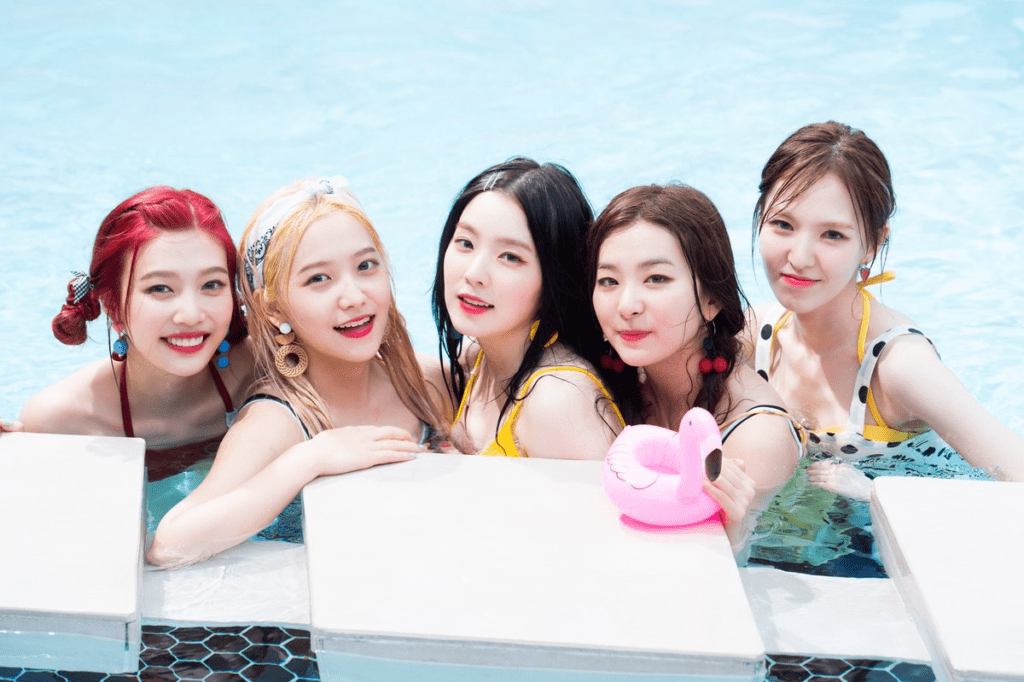 Kpop girl group Red Velvet in a pool with a bright concept for Red Flavor