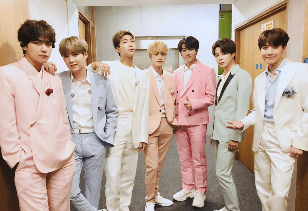 Kpop Boy group BTS showing their fashionable pastel suits