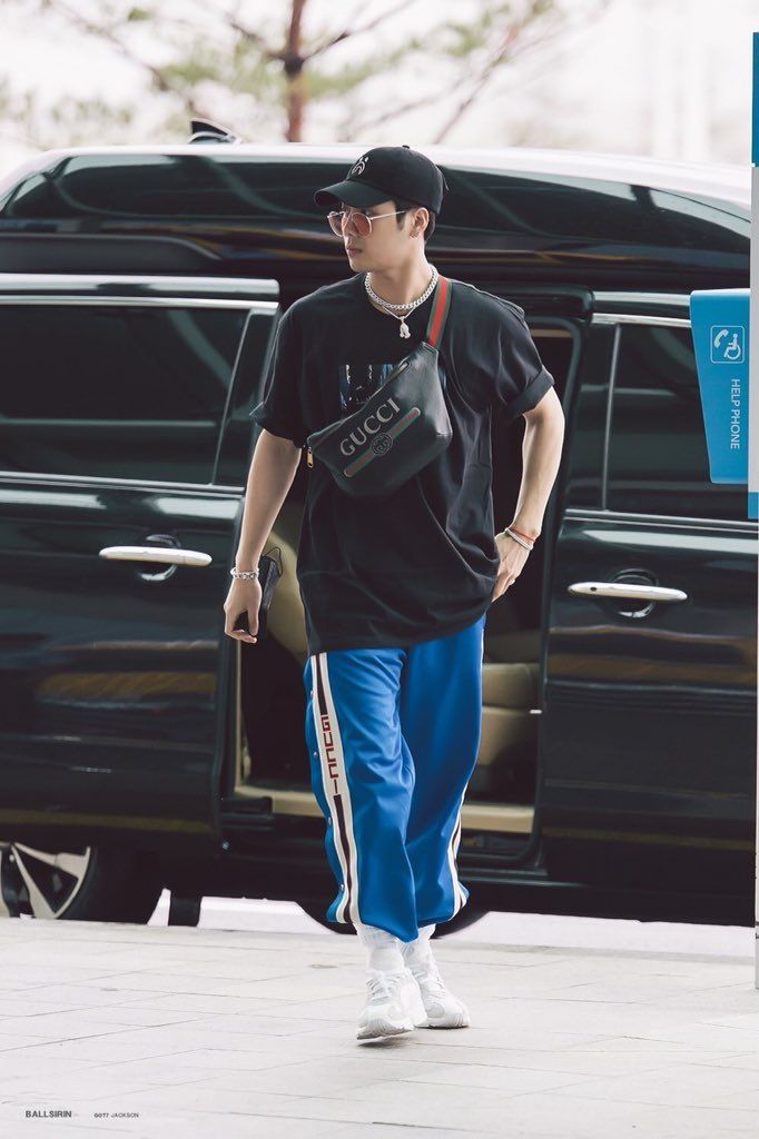 Kpop idol Jackson Wang wearing a cool streetwear outfit