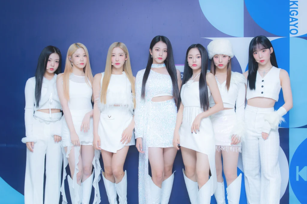 CLASS:y in white outfits to perform their Kpop Christmas sing Winter Bloom