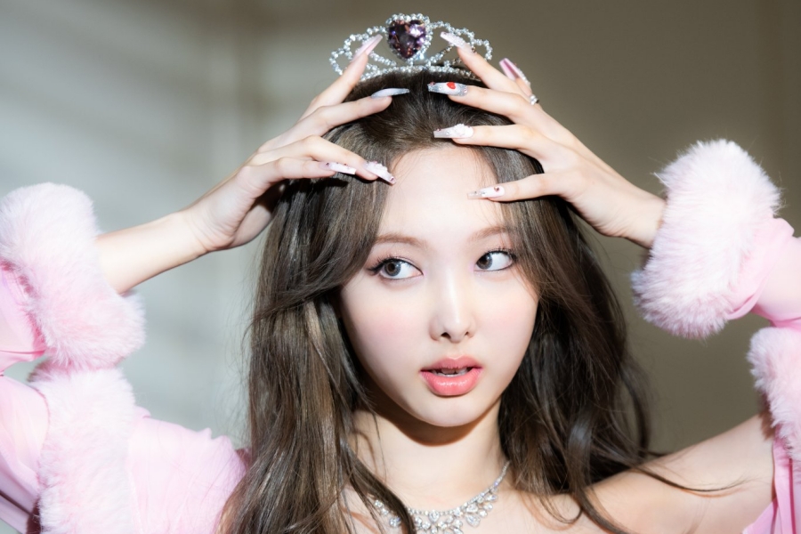 Nayeon wearing a crown for a photoshoot